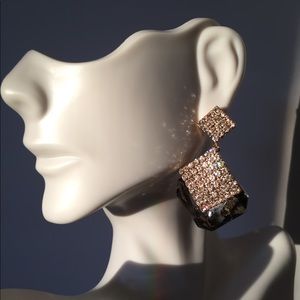 Gold and black earrings